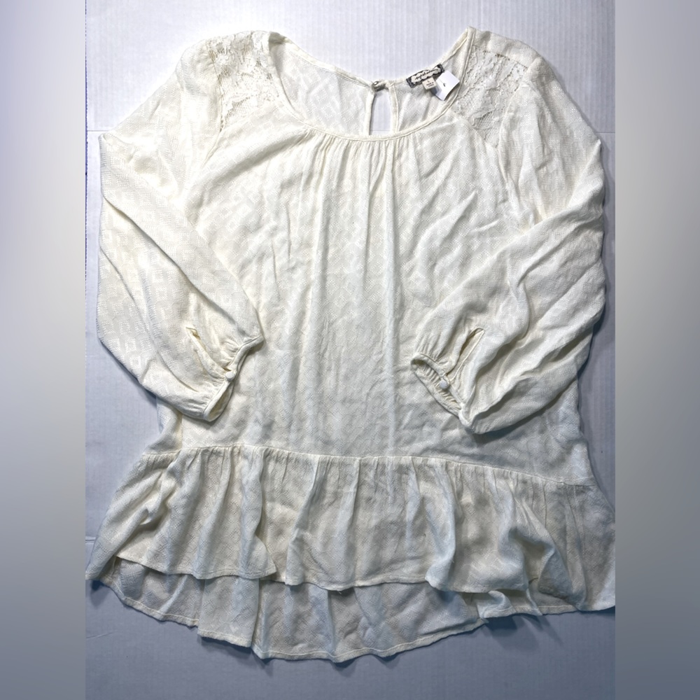Eyeshadow brand top with peplum detail at waist lease inserts